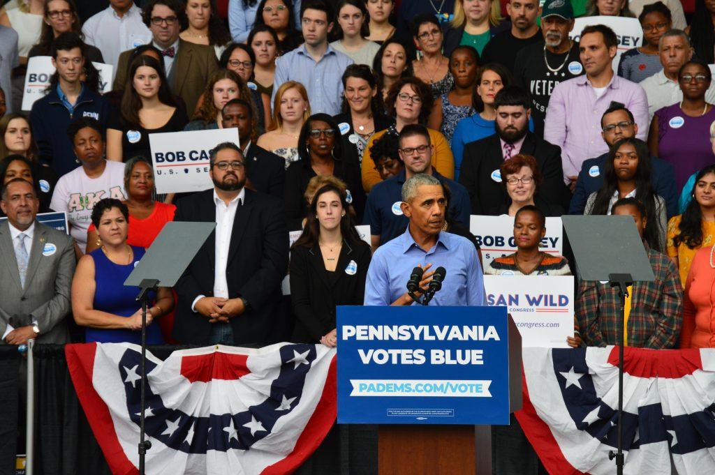 Former President Barack Obama makes a guest appearance and encourages the crowd to vote this November. Staff Photographer Hannah Woodruff