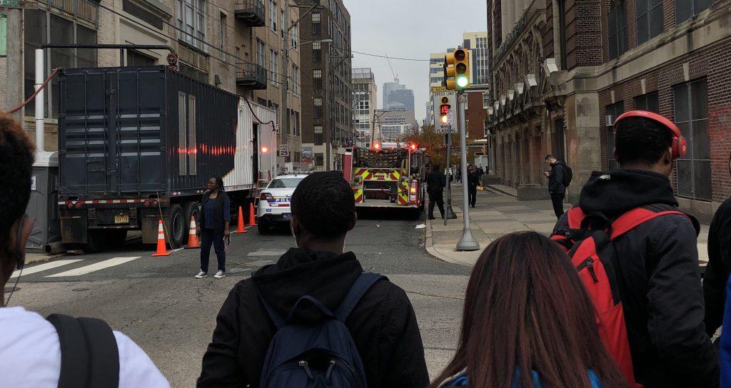 Students wait to re-enter the building after a false fire alarm at 8AM on November 20, 2018.