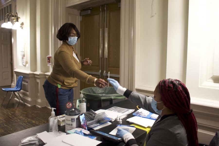 Assistant Principal Dr. LaTrina Stewart takes a weekly COVID test