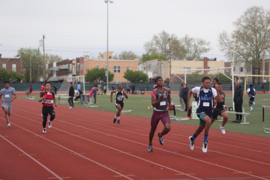 FLC’s student athelete competing vigorously at a track & field meet.