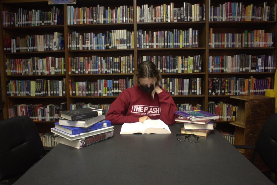 PHOTO ILLUSTRATION | Finding a comfortable area with no distractions such as a library can help you with your studies, allowing you to get good grades.