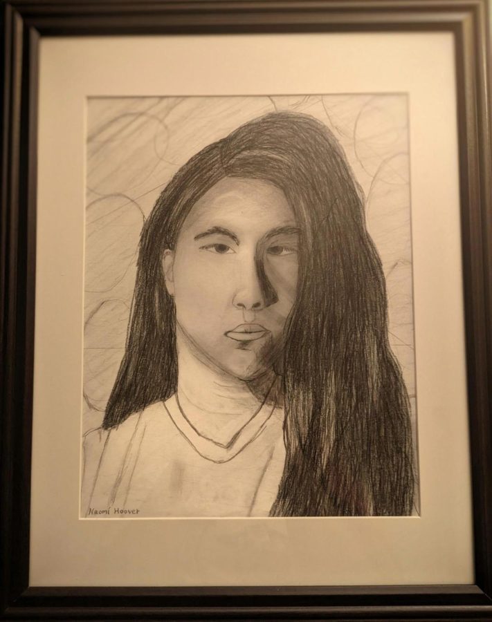 A self portrait of Naomi from freshman year, one of the first assignments in her art class.