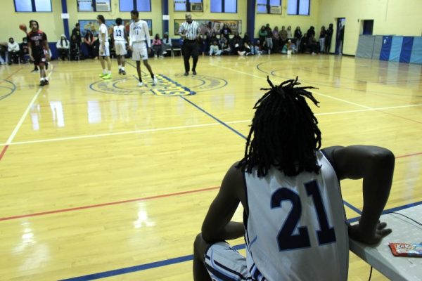 Player Amir Stevens (21) waits to be put into the game 